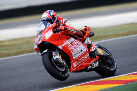 Мотоцикліст в гонці Мотоцикліст в гонці