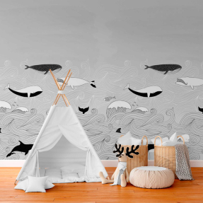 Киты на волнах