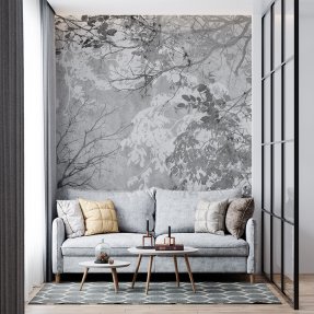 Гілки дерев на фоні бетону